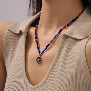 Collana di perline bohémien con ciondolo in smalto blu sole e luna per donna moda