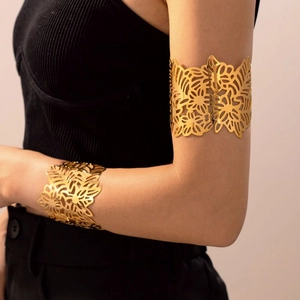 Bohemian gold hollow flower cuff bracelet and arm band set in polished 18k plated steel