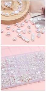 Macro detail of assorted irregular ABS faux pearls in a transparent organizer box