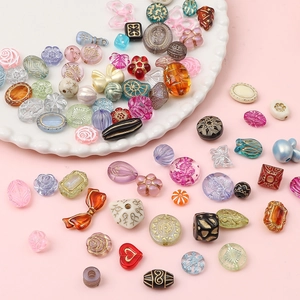 Mixed baroque acrylic gold-painted beads in floral and heart shapes for DIY jewelry making