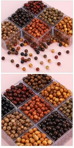 Detailed macro view of assorted natural wood beads with polished grain in clear cases