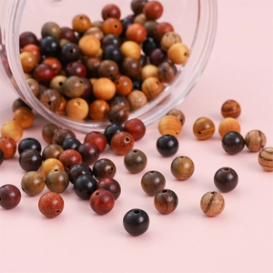 Polished natural wooden beads in mixed colors and textures for DIY jewelry making