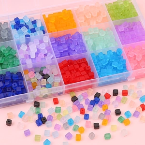 Multi-colored 5x5mm frosted glass cube beads for DIY jewelry with a clear storage box