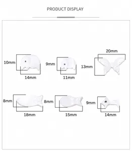 Detailed view of white shell charms in elephant, butterfly, and fish shapes for DIY jewelry