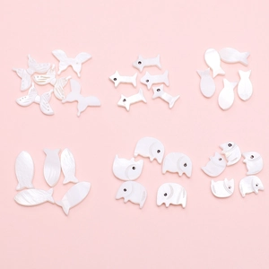 Natural shell beads for DIY jewelry making featuring animal shapes like butterfly and dog