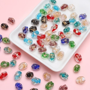 Handmade oval glass beads with gold leaf inlay for DIY jewelry in mixed vibrant colors