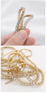 Close-up of 14k gold plated copper tennis chains with sparkling zircon stones