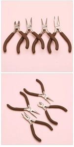 Close-up of professional carbon steel jewelry pliers with brown non-slip handles