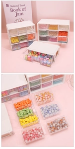 Detail of multi-grid acrylic storage box with transparent drawers for DIY beads