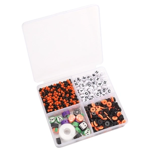 Halloween DIY bead kit with polymer clay charms and letter beads in 4-compartment box
