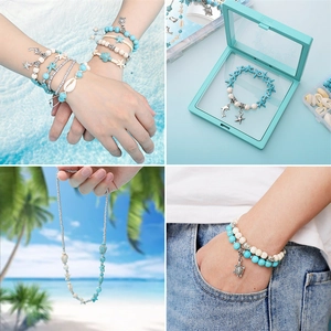Set gioielli estivi con turchese e conchiglie in confezione regalo stile oceano