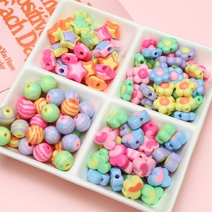 Colorful acrylic beads in star and flower shapes for DIY jewelry making and crafts