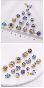 Detail of 18K gold plated cloisonne charms with blue enamel butterfly and lotus designs