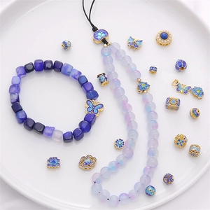 Blue and purple enamel butterfly jewelry set with gold-plated lotus flower bead charms