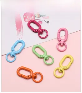Close-up of colorful matte rotating lobster clasps for DIY jewelry and keychain crafts