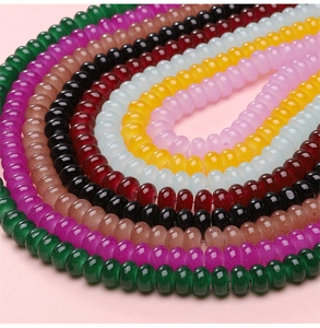 Detalle de cuentas de vidrio coloridas de 8x5mm en forma de ábaco para joyería DIY