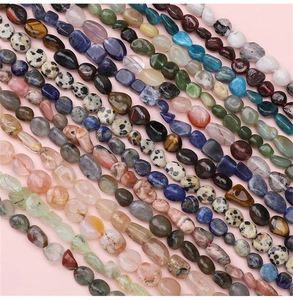 Macro shot of 5-8mm irregular natural gemstone beads in various colors for jewelry making