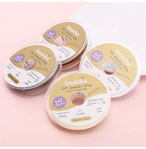 Fil d'acier inoxydable 304 revêtu de nylon 0,6mm pour perlage de bijoux DIY