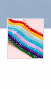 Macro shot of colorful imitation jade glass beads for DIY jewelry making and crafts