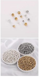 Makroaufnahme von 14K vergoldeten facettierten Perlen für DIY-Schmuck in verschiedenen Größen