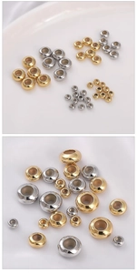 Macro view of 14k gold-filled and silver silicone positioning beads in various sizes