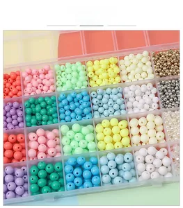 Detailed view of a 24-grid jewelry box with colorful acrylic beads for DIY necklaces