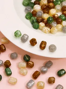 Macro view of marbled amber acrylic beads in rectangular shape for DIY jewelry making