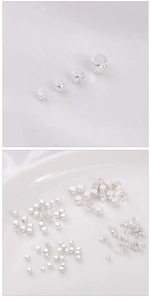 Close-up of silver-plated cube beads in various sizes for DIY jewelry making