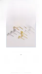 Detail of ball stud earrings with loops in gold and silver finishes for DIY jewelry making
