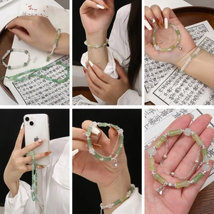 Bamboo-style glass bead bracelets and phone lanyards in jade green and milky white