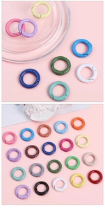 Macro shot of colorful round alloy spring buckles for DIY jewelry and bag accessories