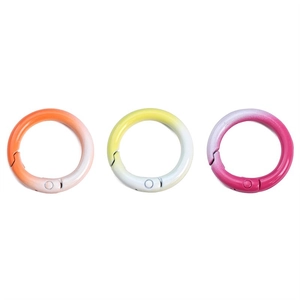 Three gradient colored round spring O-rings for DIY keychains and bag accessories