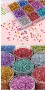 Macro detail of colorful glass seed bead sets in various organizers and containers