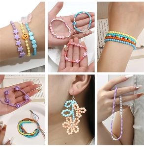 DIY jewelry set detail featuring pastel acrylic beads used in bracelets and earrings