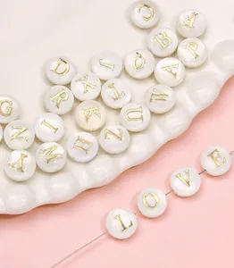 DIY shell beads with golden letters for making customized jewelry bracelets and necklaces