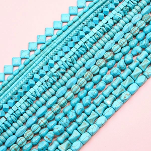 Various shapes of turquoise loose beads including cubes and cylinders for DIY jewelry making