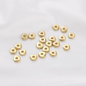 14K gold filled triangular spacer beads for DIY jewelry making on white silk