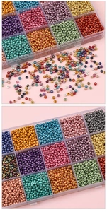 Close-up of premium colorful glass seed beads set in a transparent multi-grid storage box