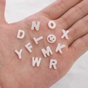 White freshwater shell letter beads and smiley face charms for DIY jewelry making