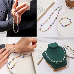 Ensemble de bijoux perlés avec fleurs millefiori colorées et perles baroques