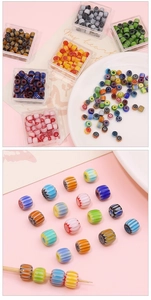 Macro shot of 8mm millefiori glass pumpkin beads with colorful stripes for DIY jewelry