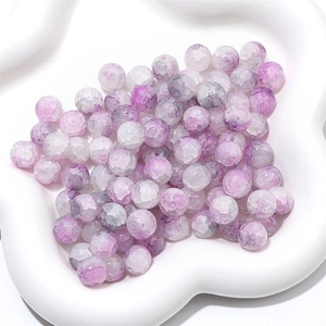 Macro shot of purple crackle glass beads with dragon vein texture for DIY jewelry making