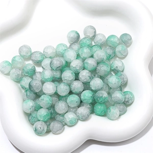 Detailed view of cracked ice pattern glass round beads for DIY jewelry making