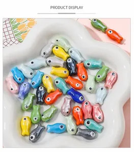 Perline colorate in ceramica a forma di pesce per la creazione di gioielli fai da te