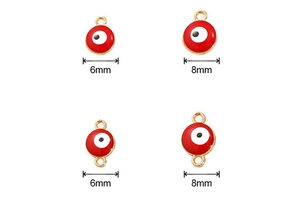 Detail view of 6mm and 8mm red evil eye charms with single and double loop connectors