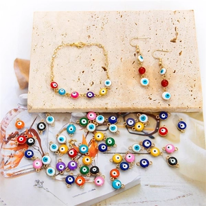Colorful DIY Evil Eye jewelry set including gold plated charms, earrings and bracelet