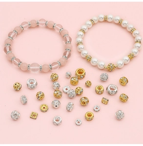 Macro shot of luxury crystal spacer beads and charms for DIY handmade jewelry bracelets