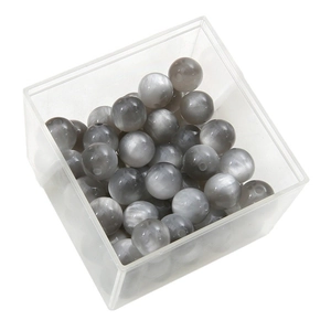Polished grey resin cat-eye effect round beads with holes in clear storage box