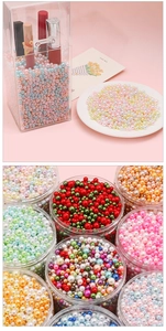 Macro detail of assorted colorful ABS faux pearls used as cosmetic box fillers and DIY beads