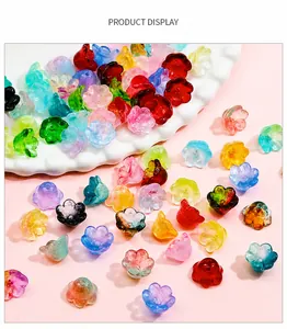 Macro shot of colorful gradient lily of the valley glass beads for DIY jewelry making